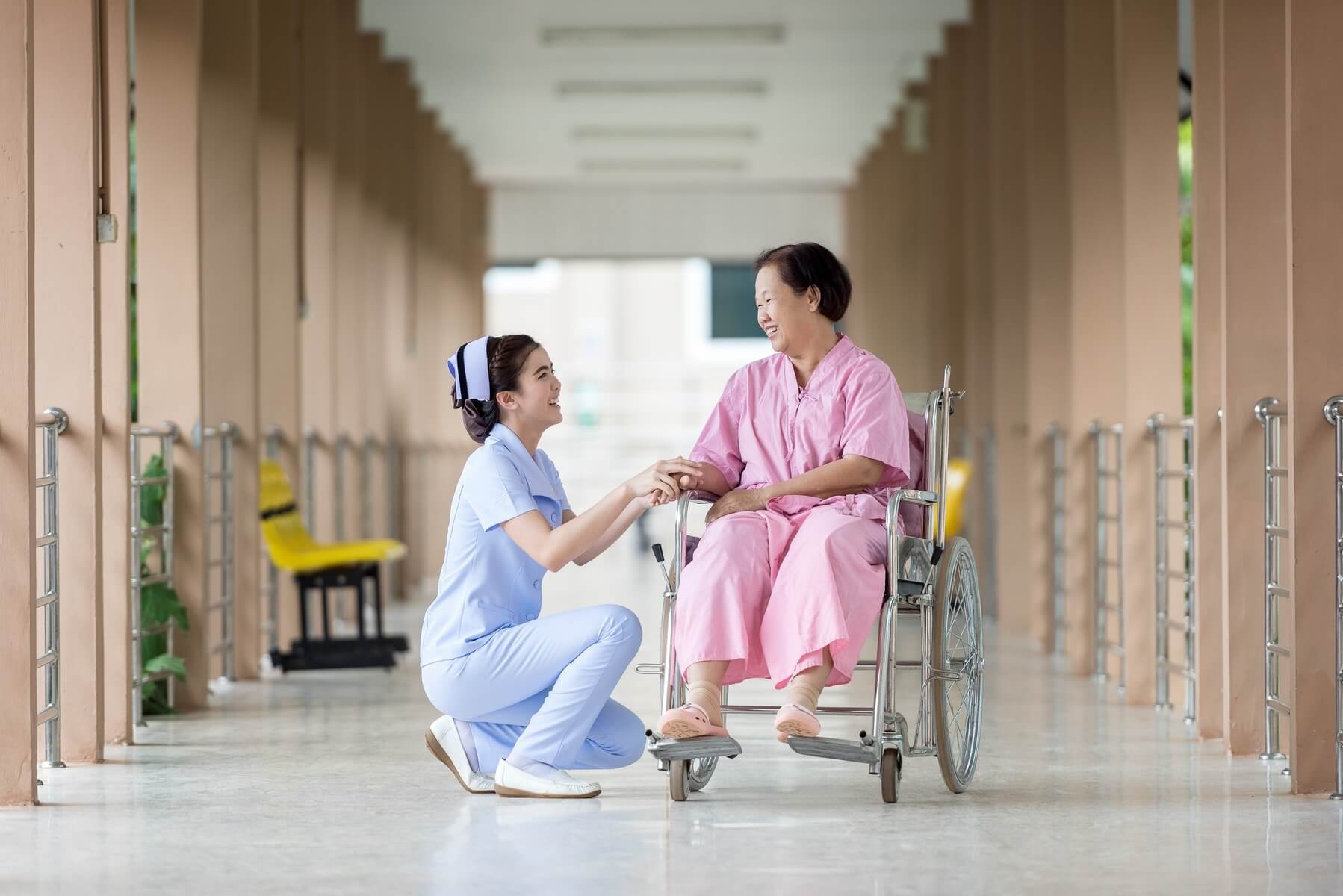 A physical therapist guiding a patient through rehabilitation exercises.