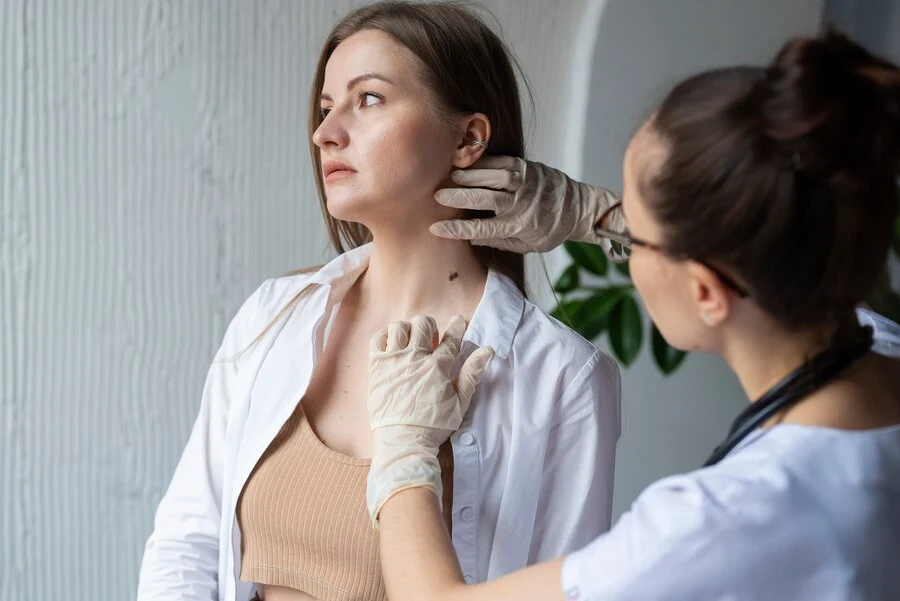 A Nurse give the treatment of the Skin Biopsy.